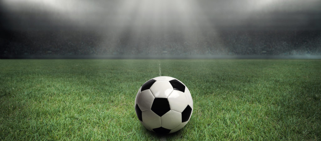 Close-Up Of Soccer Ball On Grass