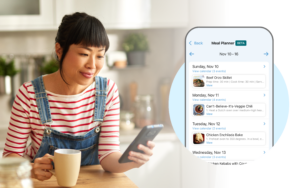 woman using cozi app to plan meals